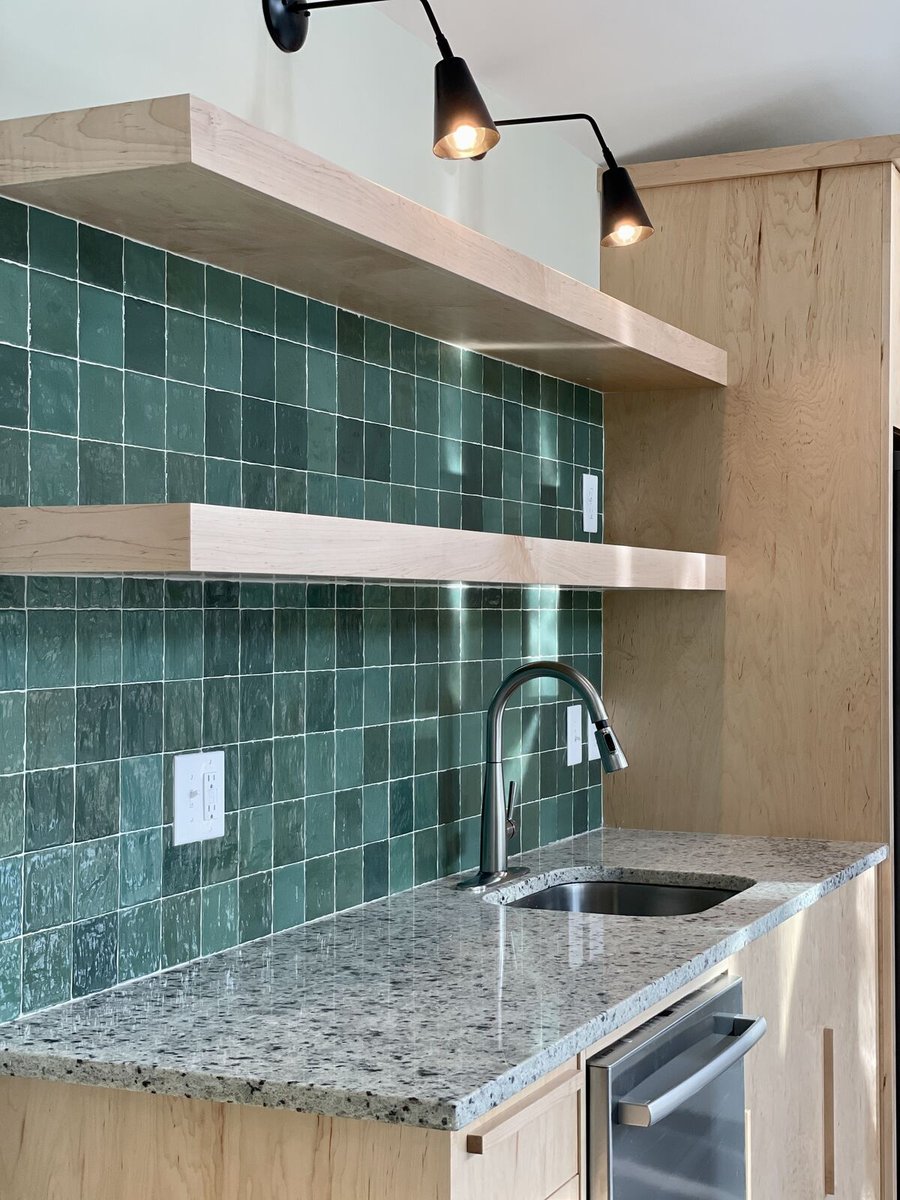 green-tiled-kitchen-backsplash-remodel-with-floating-shelves