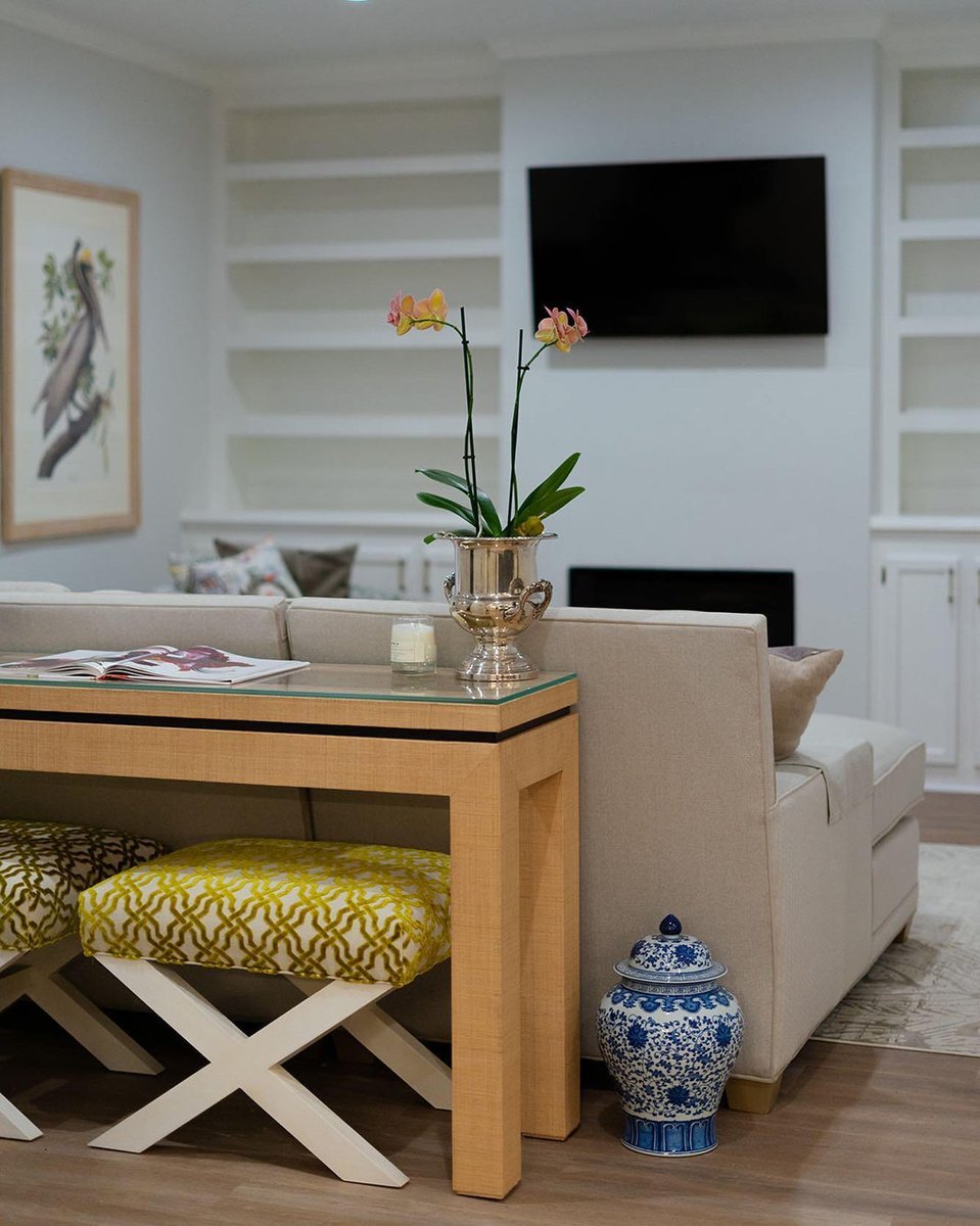 South Carolina living room with built-in bookshelves and mounted TV.